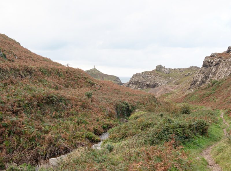 View down the Kenidjack Valley with Cape Cornwall Mine stack from path beside the Tregeseal River 01_10_24